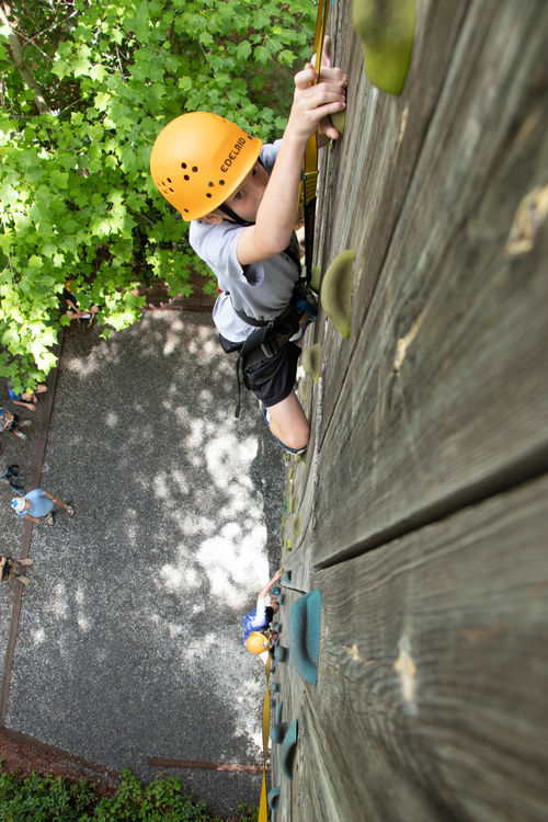 Focused all the way to the top of the wall on the final full day of activities