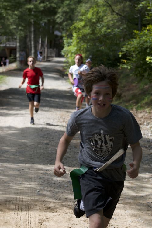 Running to find supplies during the all-camp-game
