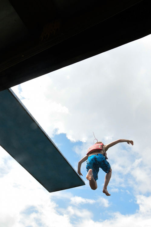 Competing in the high dive splash-off