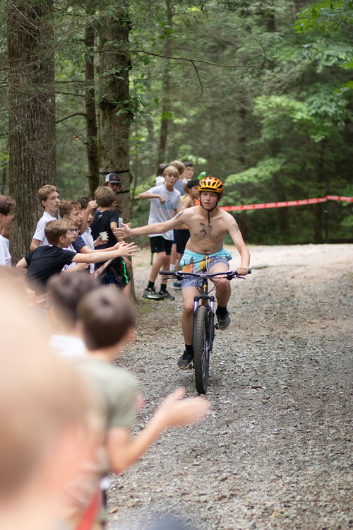 High fives on the 2nd section of the Ironman: mountain biking
