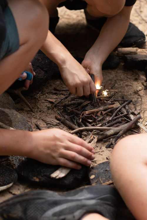 Practicing fire building with flint and steel in OSC