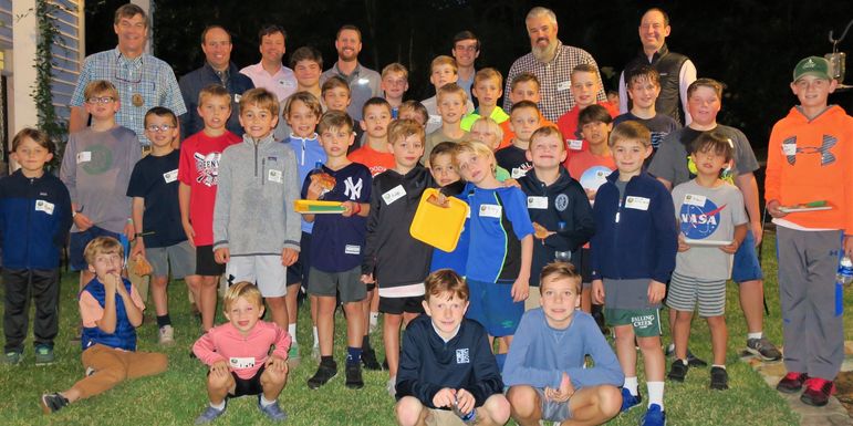 The dads who have attended Father/Son Weekends, staff, and alumni, all joined the boys for a big group photo in Greenville.