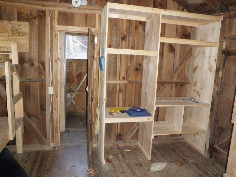 We’re replacing the old closets in the FCC cabins with new cubbies and a desk for the counselor