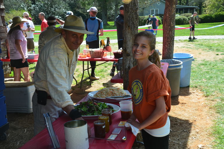 Starr and his daughter Virginia Frances setting up their famous Hubba Hubba Barbque feast for all the racers, volunteers and supporters