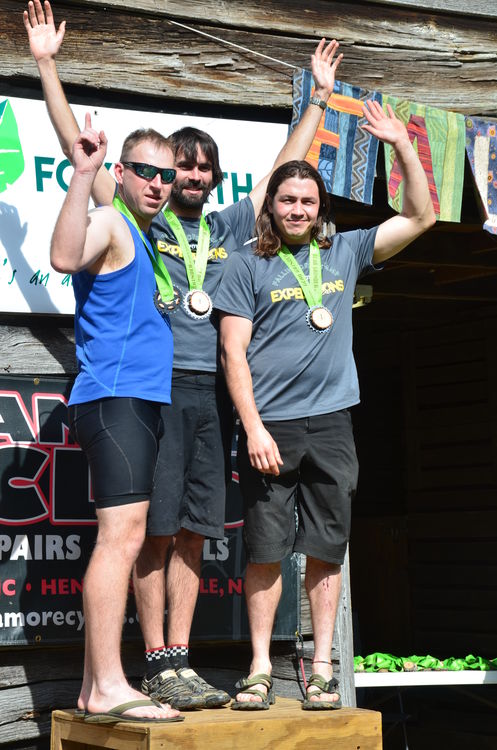 Falling Creek Camp’s Ken Johnson, Raybot Hailey, and Dewayne Maynard take the top prize in the men’s team race.