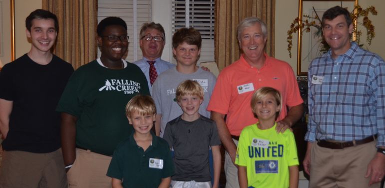 The boys, dads who have gone to Father/Son Weekend, KD, and Jacob McKee, stop for a group photo just before we watch the new movie. Jacob, a SCAD student, was co-producer of the new movie. Jacob also designed the exclusive 2015 Trunk sticker.