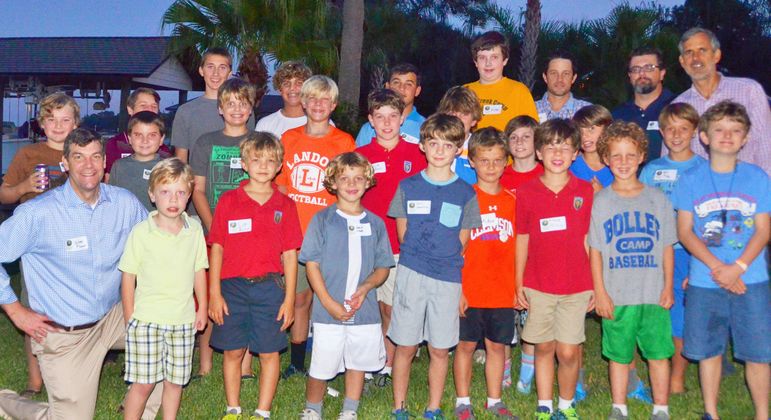 The returning campers, boys who came to learn about FCC, staff, alumni, and dads who have attended Father/Son Weekend, paused to have their group photo taken.