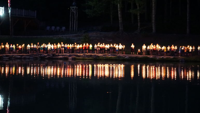 Encircling the lake with our candles