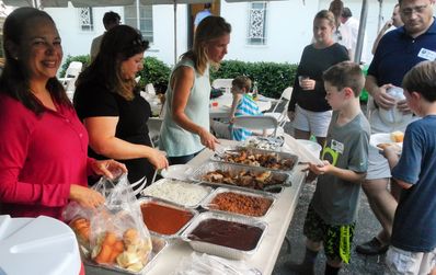 The Holly’s served up a huge treat of barbeque chicken, beans, rice, and a big cookie for dessert.