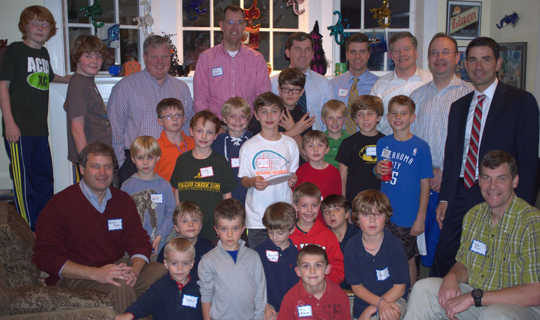 Dads who went to FCC as campers or took their sons to the Father/Son Weekend joined the boys in the group photo.