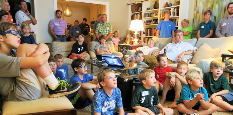 The boys and parents enjoyed watching the updated camp movie.