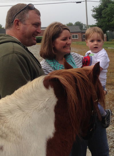 Thompson gets his turn to pet Skittles.