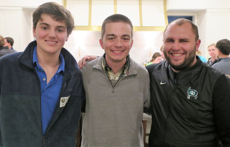 10-year camper Bo Phillips (left) reconnects with previous staff members Andrew Josupait and Mike Nuckles