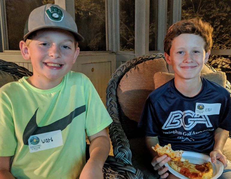 5- Year campers Ward and Ellis catching up over pizza