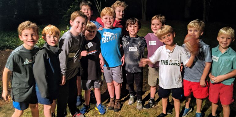 The boys enjoyed eating pizza and playing some football in the back yard before we watched the updated camp movie.