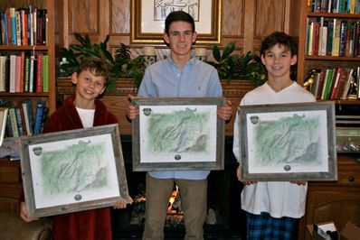 (l to r) Nathan Jess and Andrew are excited to receive their framed FCC Waypoints Maps on Christmas morning 2013.