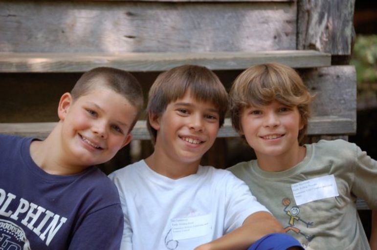 Jake Lambrecht, center, as a young camper. He is returning this summer as an incredible mountain bike instructor!