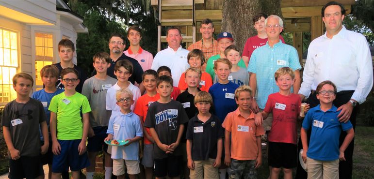 Dads who have joined their sons at FCC for Father/Son Weekend jumped into the group shot tonight. Chris Garbo (back left), from Naples, FL, took time out of his busy schedule at the University of Florida to come say hello and support. Chris has been coming to the mountains of North Carolina for seven summers as a camper, CIT, and now counselor at Falling Creek.