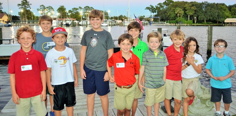 Part of the group paused momentarily between freeze tag games to have their photo taken in the back yard of the Athey’s home.