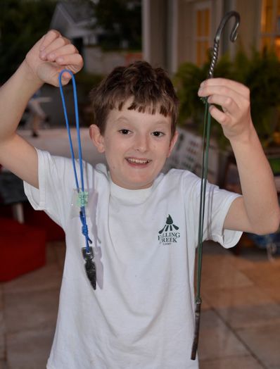 Gunnar brought his arrowheads and j-hook he made in blacksmithing and did a great job telling the large group about his experiences.