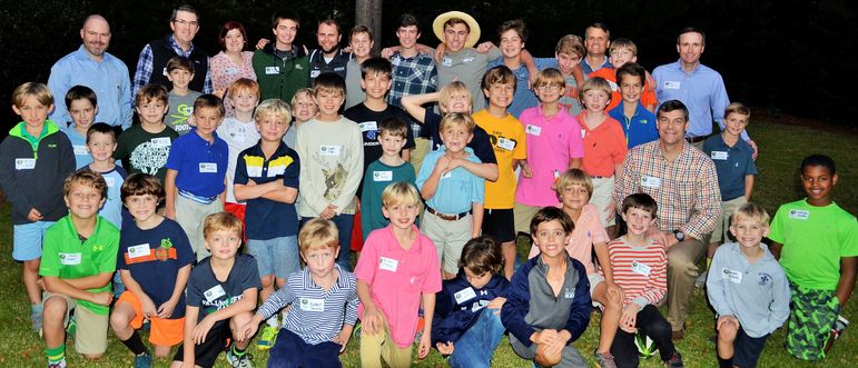 Many of the campers and boys who came to learn more about Falling Creek were joined in a big group photo by FCC staff who live in the area and dads who have attended Father/Son Weekends or were campers at FCC when they were young.