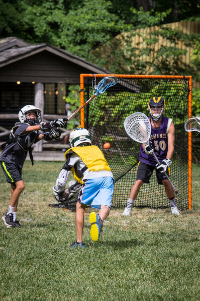 Campers playing Lacrosse at Falling Creek Camp.