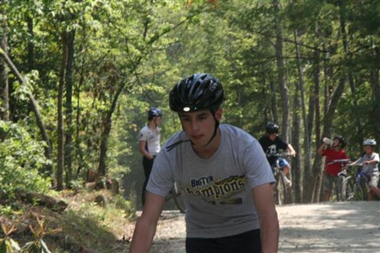 Mickey mountain biking as a camper