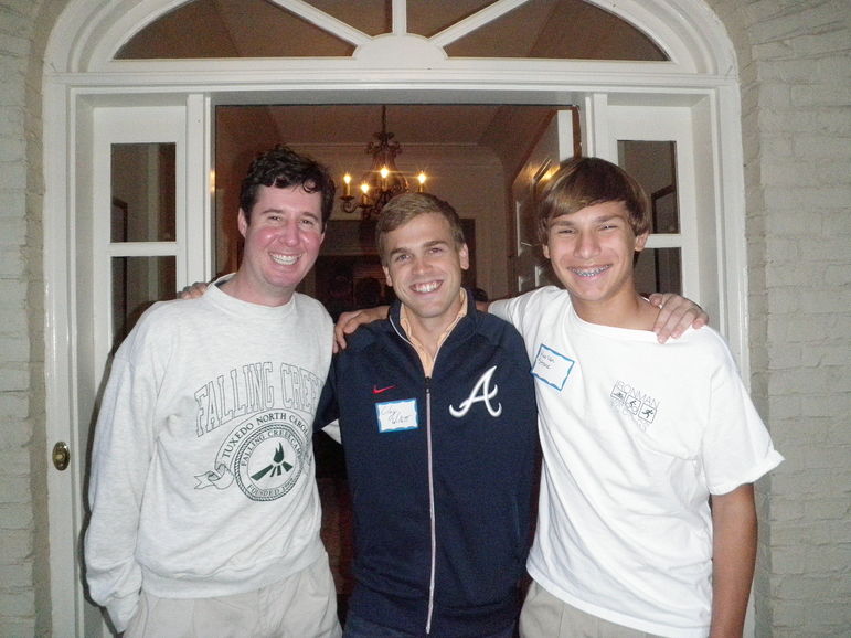 (l to r) Render Braswell, Clay Willett, and Camper Harlan were among several staff and campers greeting families at the front door