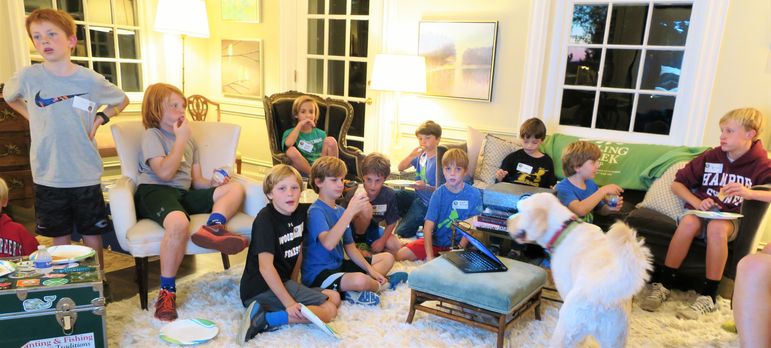 The boys especially enjoyed eating pizza while watching a slide show of photos that has accompanying morning assembly music.