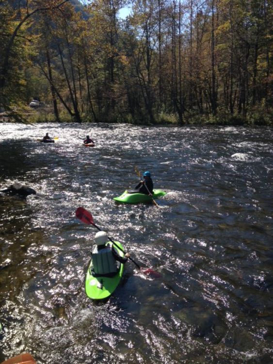Tristan, Will, and Robert paddling on the Nantahala River with Tristan’s dad